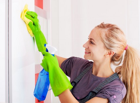 Carpet cleaning team starting work with safety precautions in place